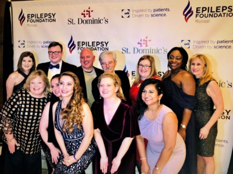 Group of students pose for a picture at the Epilepsy Foundation event.